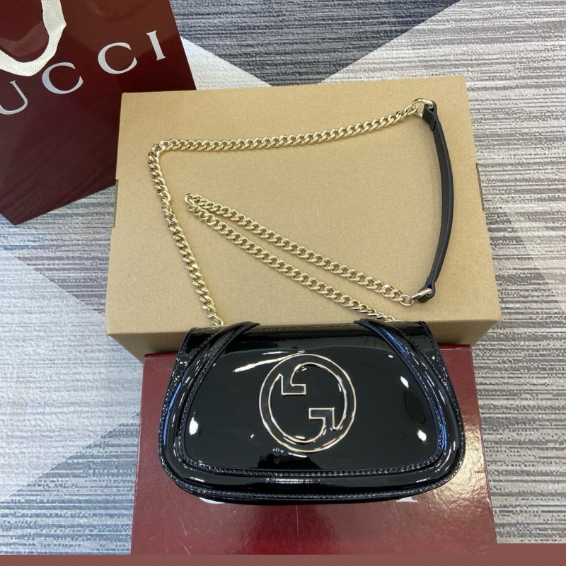 G*u*i satchel bags